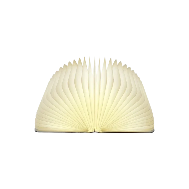Lumio Book Lamp — origami-inspired portable LED light with warm glow and walnut wood cover