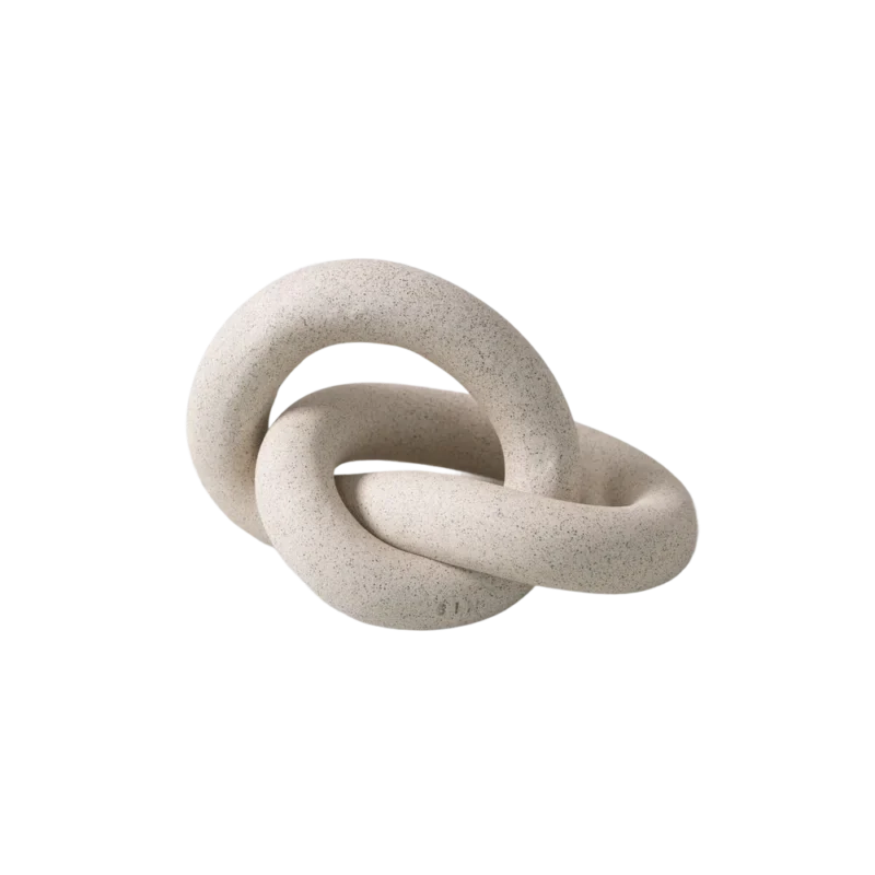 SIN Infinity Knot – speckled ceramic sculpture, intertwined loops with sand finish