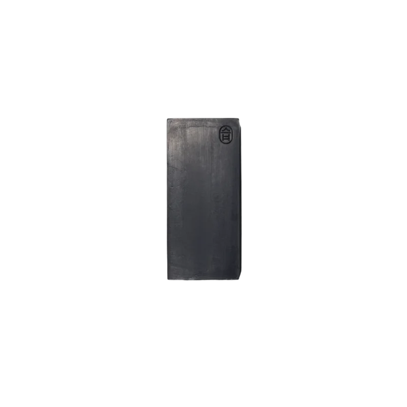 Binu Binu Shaman Charcoal Soap — sculptural black bar soap with embossed Korean logo, matte charcoal finish