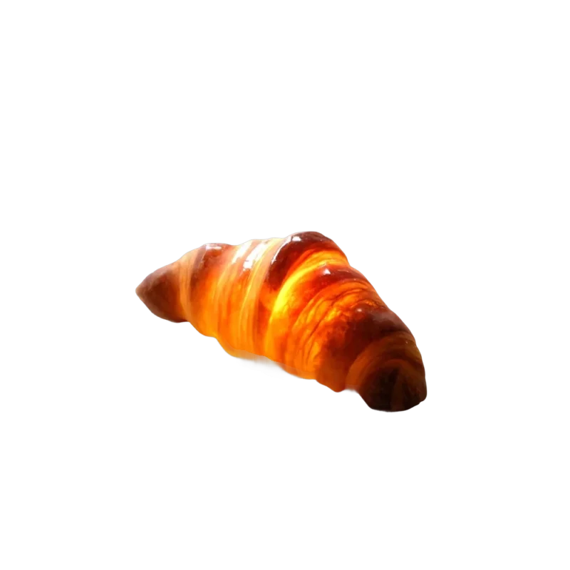 Pampshade Croissant Bread Lamp — real bread lamp with warm amber glow, golden-brown croissant illuminated from within
