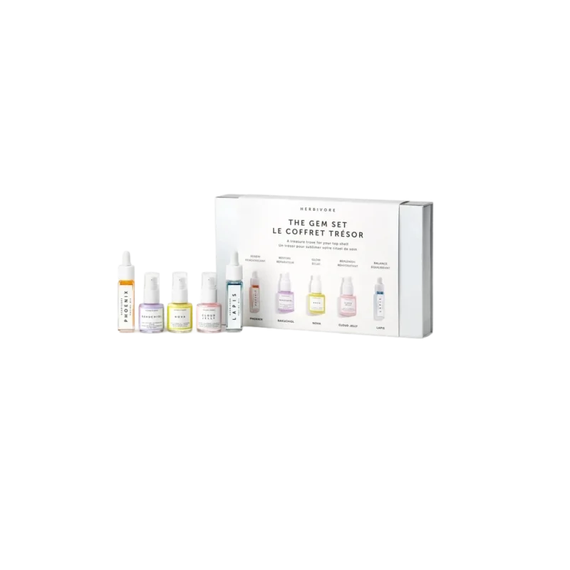 Herbivore Botanicals The Gem Set - five mini skincare serums and oils in jewel-toned glass bottles with white gift box