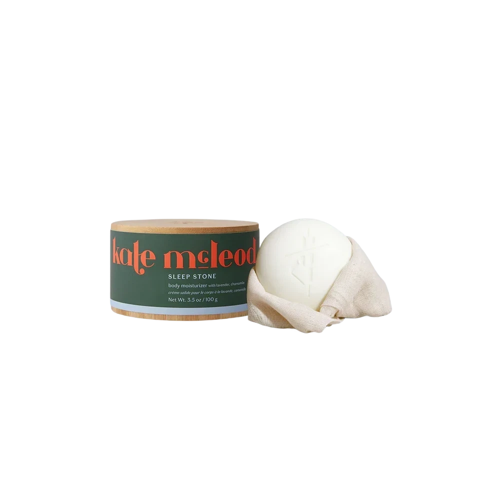 Kate McLeod Sleep Stone - solid body moisturizer, cream-colored lotion bar with bamboo canister and linen wrap
