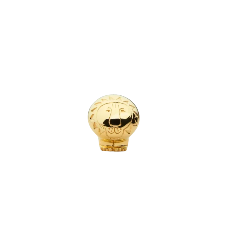 Skultuna x Lisa Larson Sitting Lion – solid brass figurine, polished gold with etched mane and gentle face