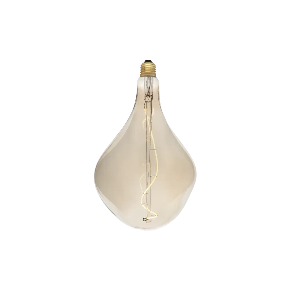 Tala Voronoi II LED Bulb — mouth-blown borosilicate glass LED bulb, iron-tinted amber glass with visible spiral Fibonacci filament