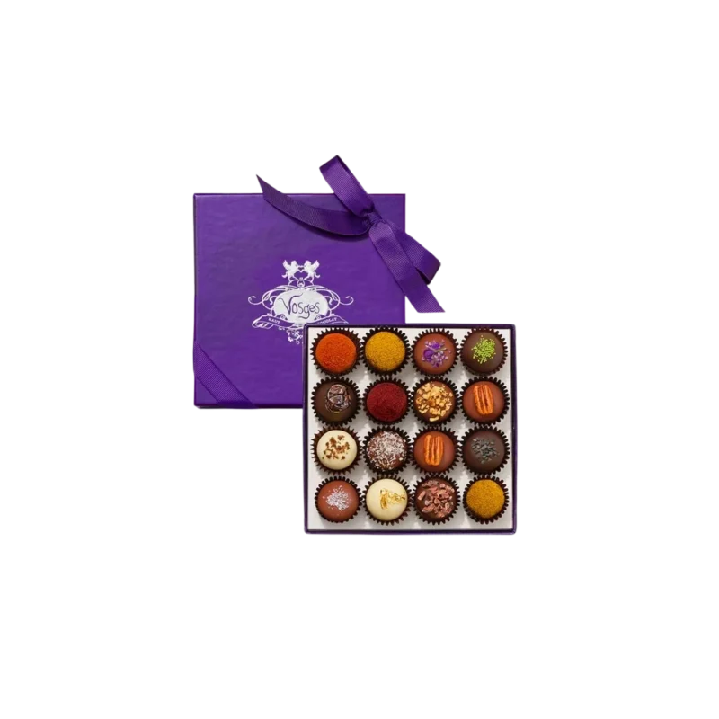 Vosges Haut-Chocolat Exotic Truffle Collection 16pc - assorted chocolate truffles in purple gift box with satin ribbon, featuring gold leaf, matcha, paprika, and pecan toppings
