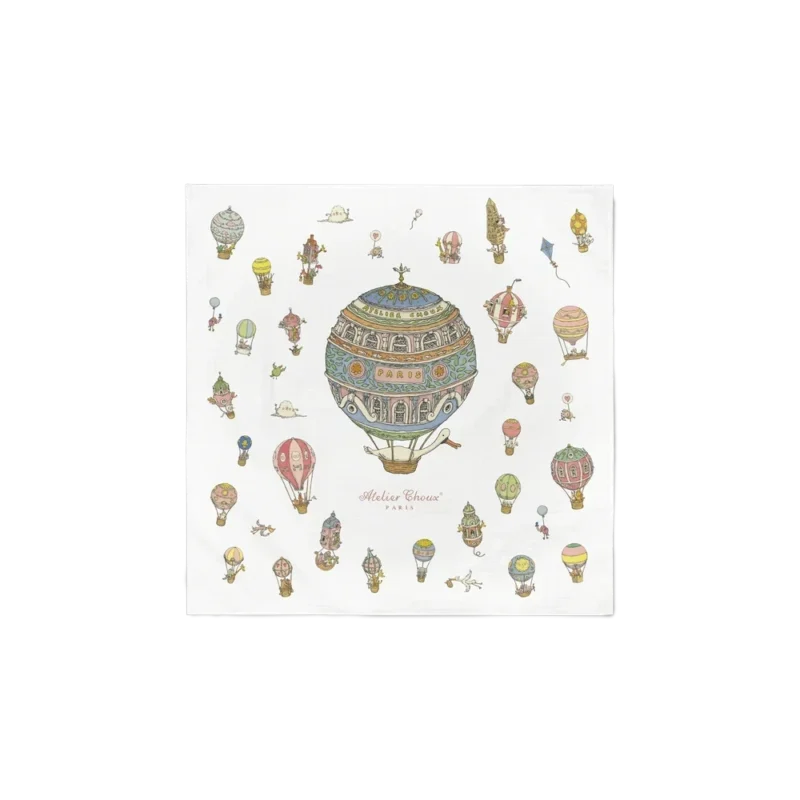 Atelier Choux Carré Hot Air Balloons — organic cotton baby blanket, whimsical illustrated balloons over Parisian rooftops on white cotton