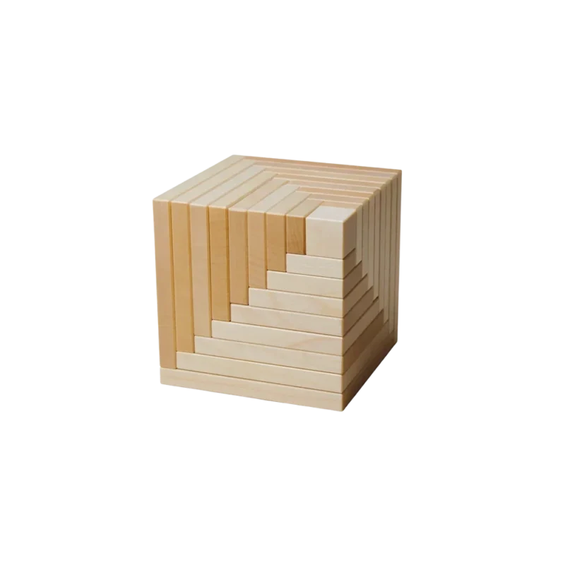 Naef Cella Natural Wood — nine nested Swiss maple half-cube shells assembled into sculptural staircase form