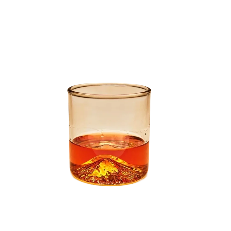 North Drinkware Mt. Fuji Tumbler — handblown whiskey glass, USGS mountain relief visible through amber whiskey in clear glass base