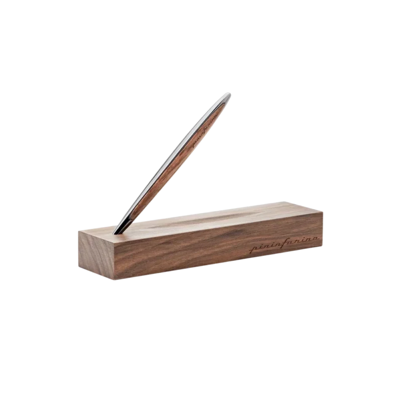 Pininfarina Segno Cambiano Classic Ethergraf — inkless writing instrument, glossy black aluminum body with walnut wood inlays resting in solid walnut desk stand