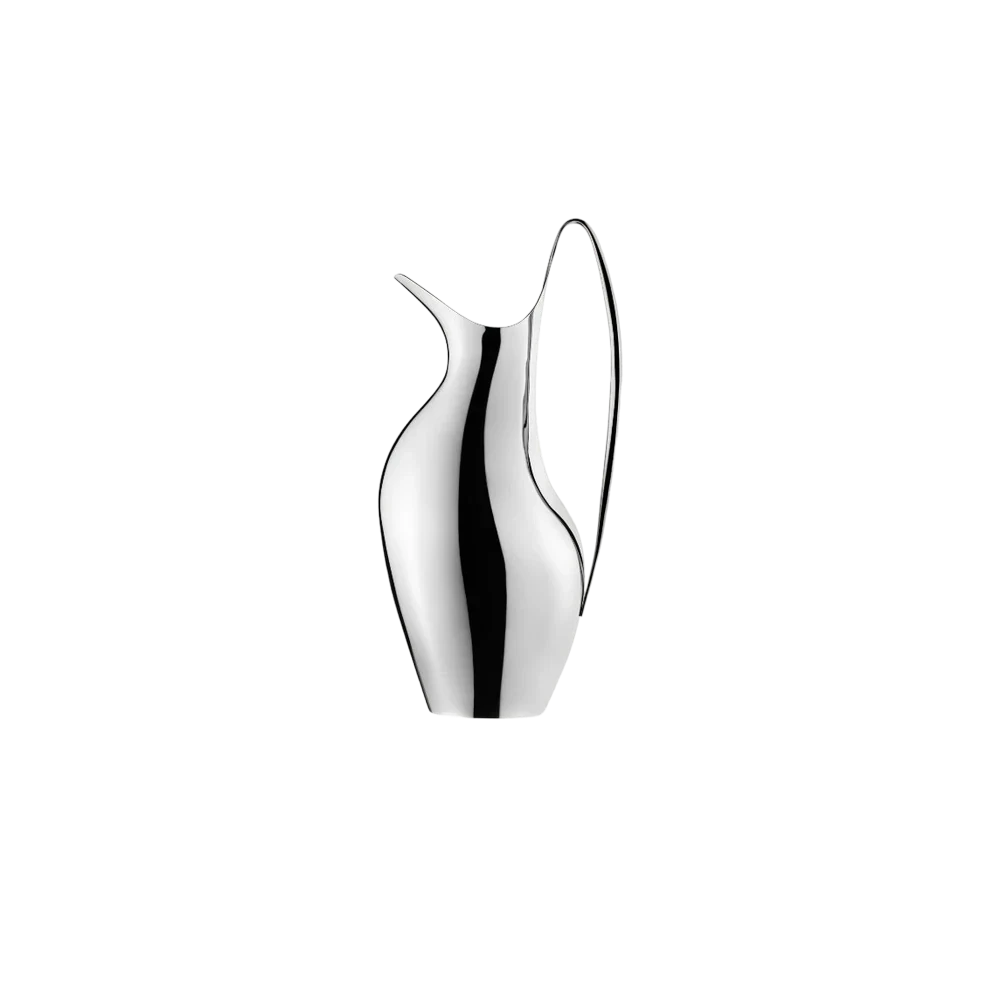 Georg Jensen Koppel Pitcher – mirror-polished stainless steel with organic sculptural curves and sweeping handle