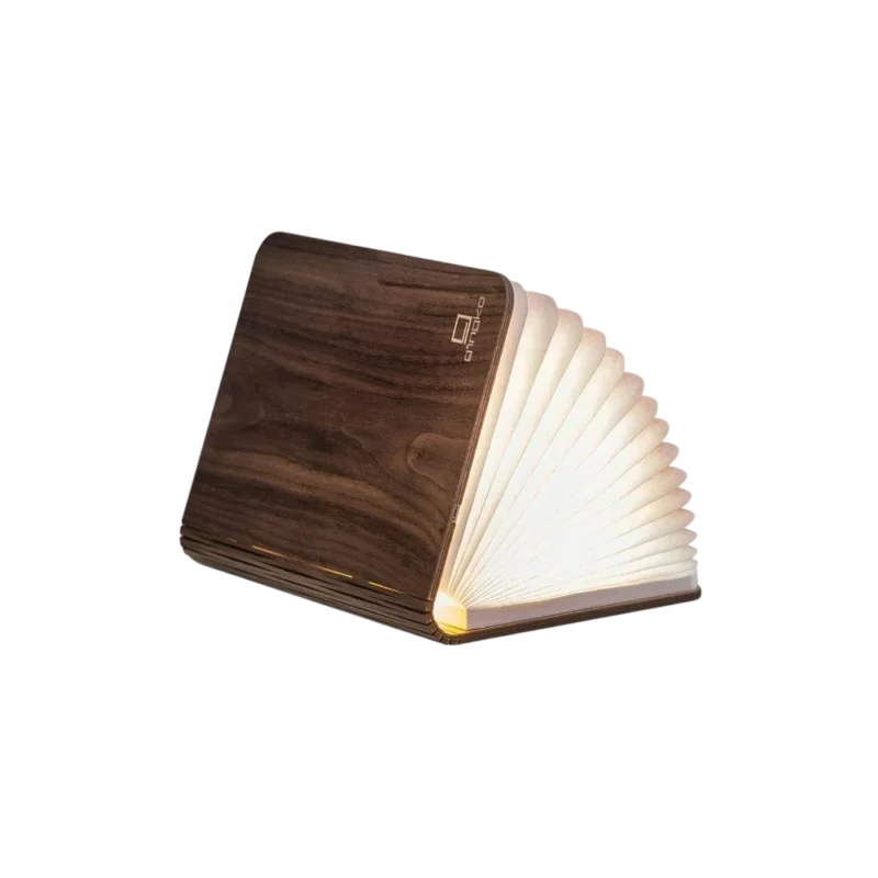Gingko Smart Book Light Large Walnut open with warm LED light glowing through Tyvek pages