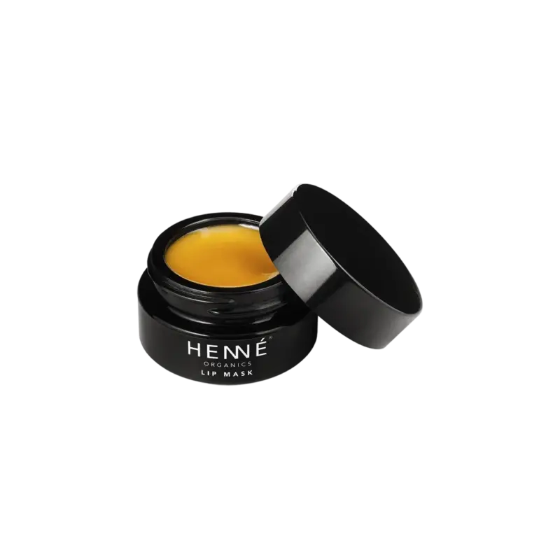 Henné Organics Lip Mask — organic lip treatment, gold balm in dark glass jar with lid resting open