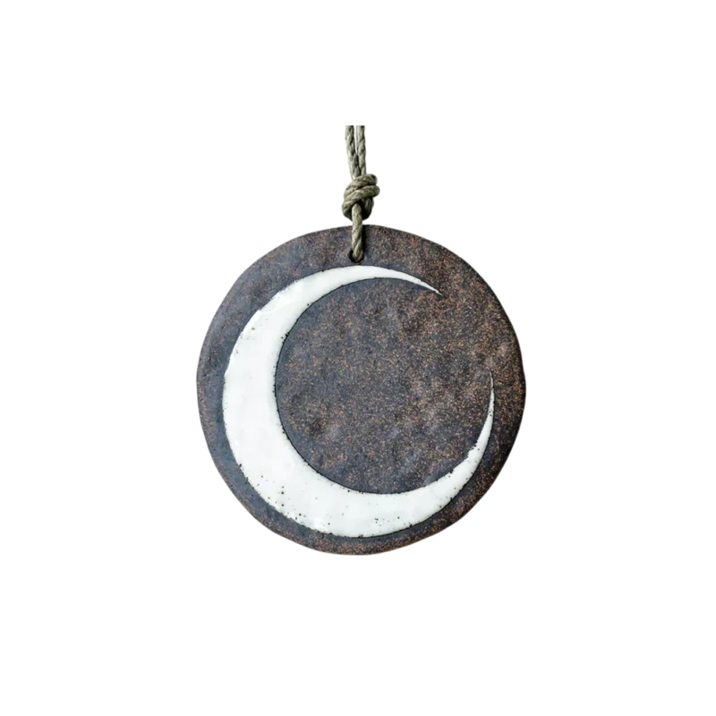 MQuan Studio Crescent Moon Ornament – stoneware wall ornament, Tucker clay with hand-painted white glaze crescent on hemp cord