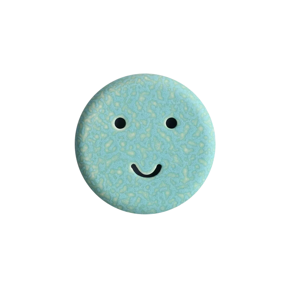 Studio Arhoj Tomo Mask, hand-glazed earthenware wall mask with reactive mint drip glaze and painted eyes
