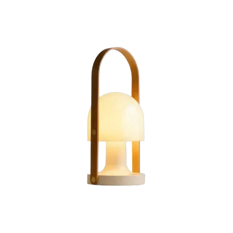 Marset FollowMe Lamp — portable table lamp, opal dome with curved oak handle glowing warm white