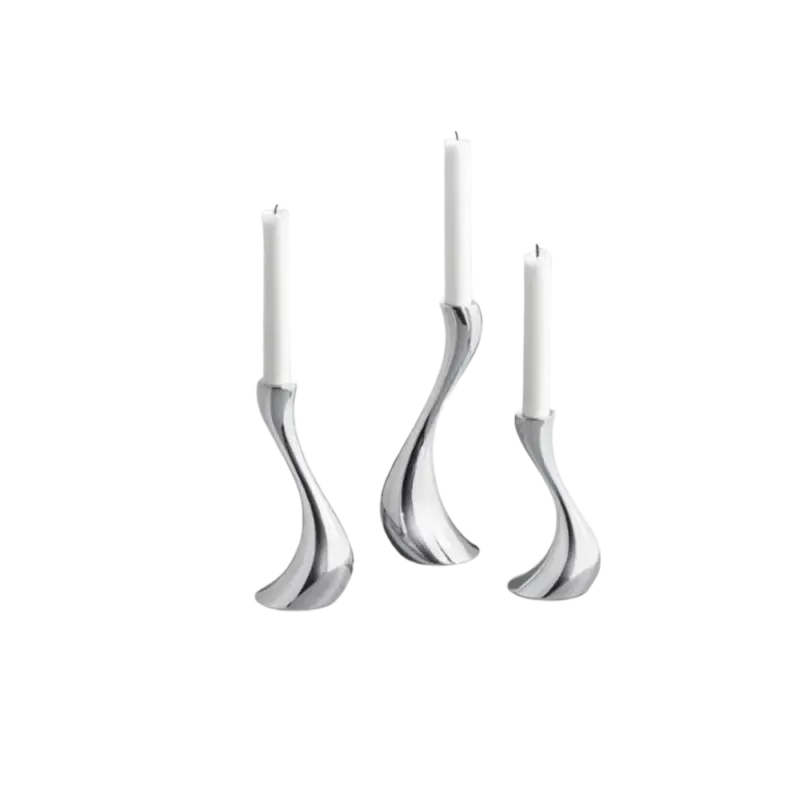 Georg Jensen Cobra Candleholder Set — mirror-polished stainless steel, three graduated serpentine forms with white tapers