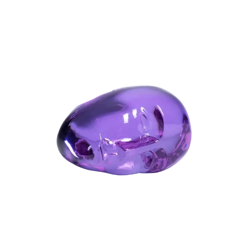 Kosta Boda Brains Go For It — crystal glass head sculpture, purple powder pigment with closed eyes and calm expression